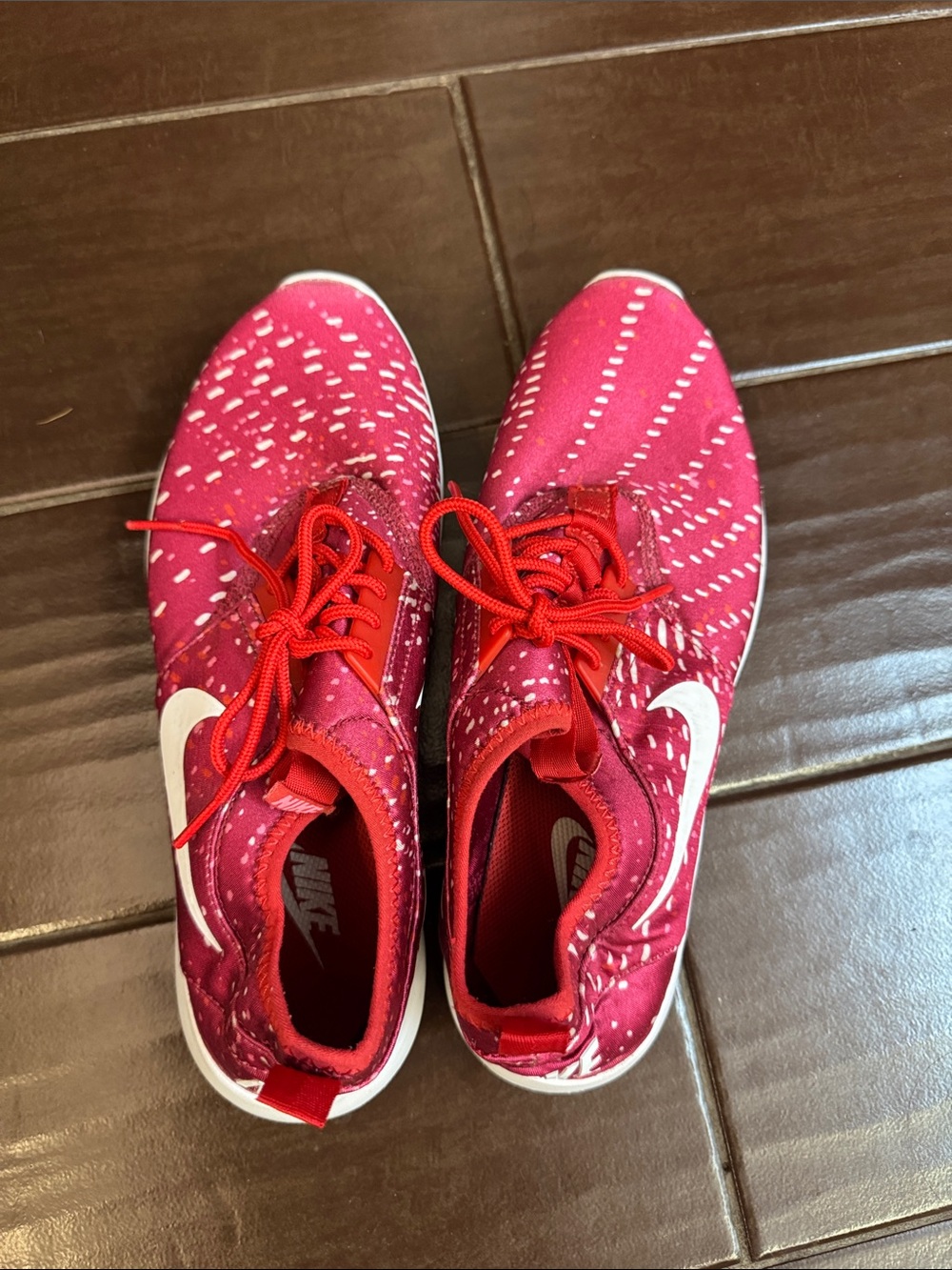 Nike Women’s Pink/Red Knit Running Sneakers with White Swoosh